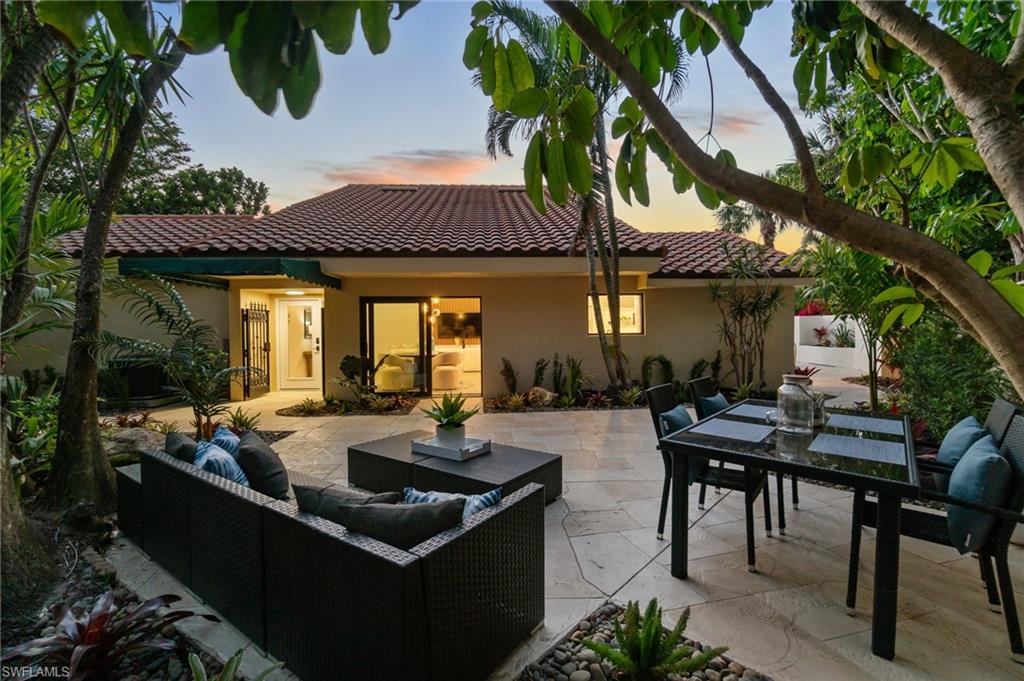 6804 Sand Pointe Circle Naples, FL 34108 - Photo 7 of 49 Your own, private, tropical courtyard for relaxing evenings, or dining al fresco - Florida living!