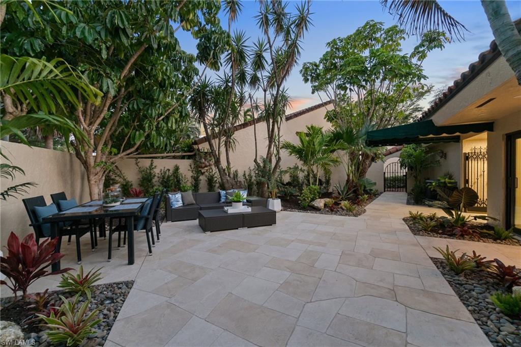 6804 Sand Pointe Circle Naples, FL 34108 - Photo 9 of 49 This Villa provides 2 outdoor spaces for enjoying the Florida weather.