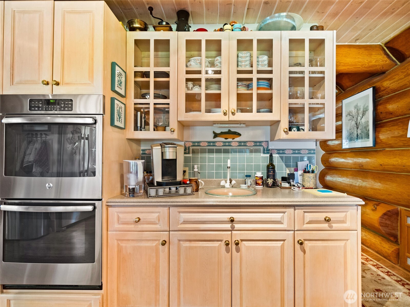 13537 Entiat River Road Entiat, WA 98822 - Photo 11 of 40 a kitchen with a sink and a refrigerator