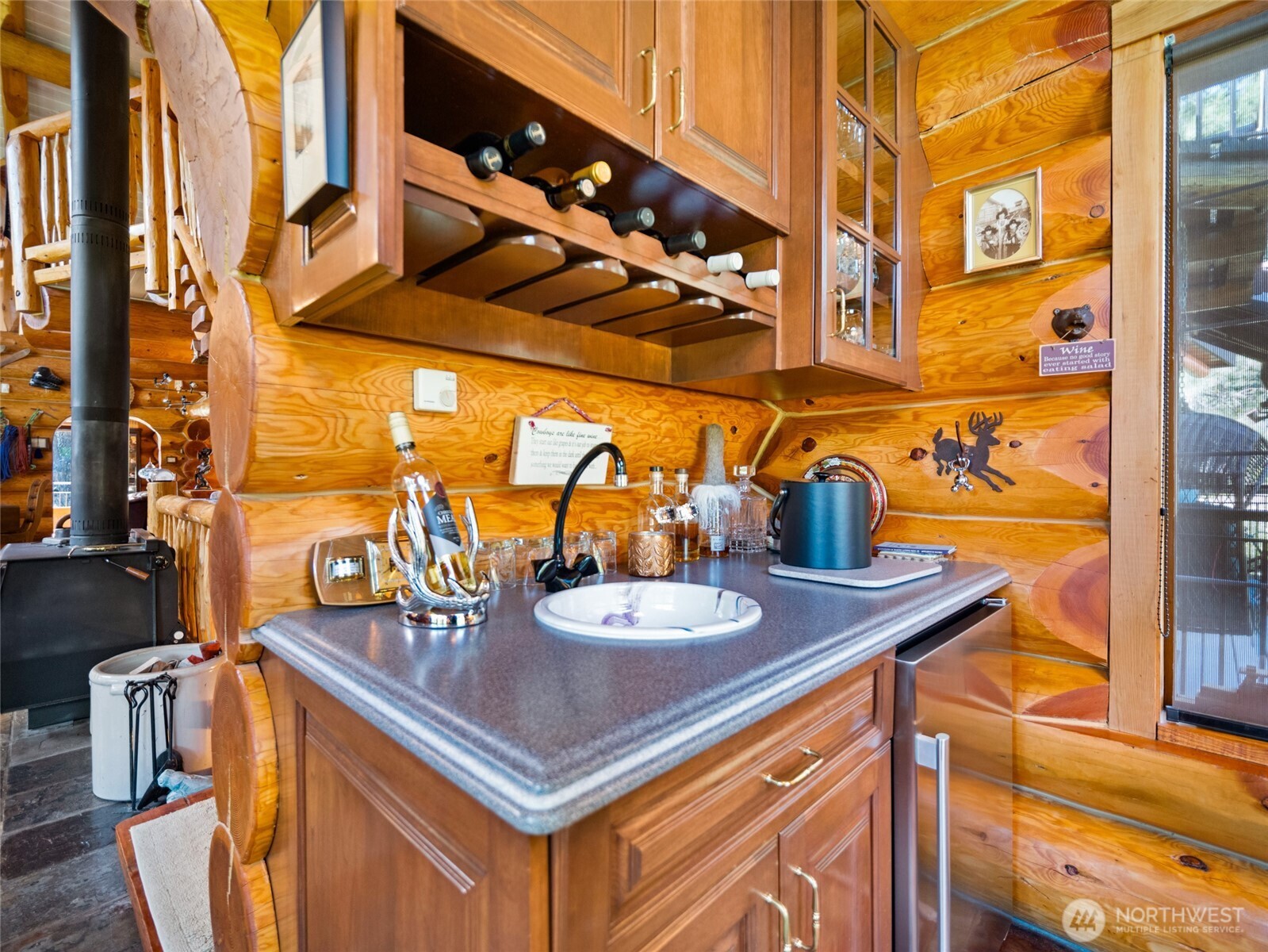 13537 Entiat River Road Entiat, WA 98822 - Photo 15 of 40 a view of a dining room with furniture and chandelier