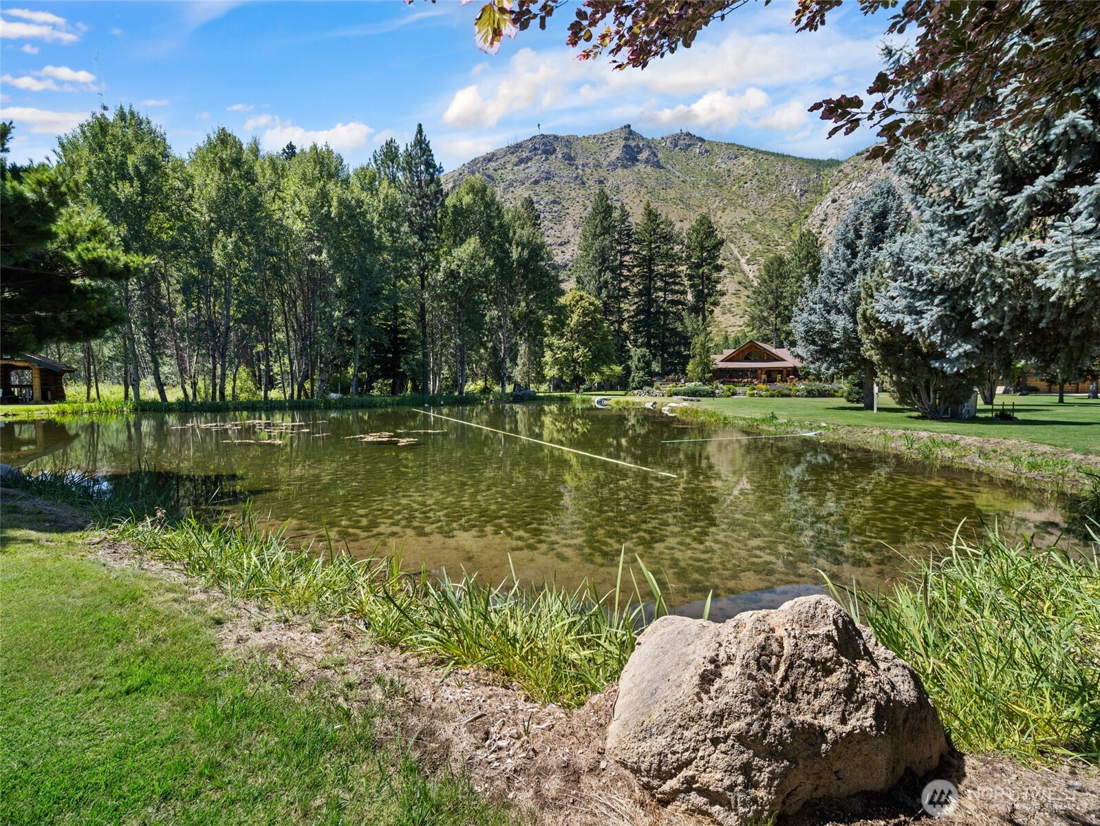 13537 Entiat River Road Entiat, WA 98822 - Photo 35 of 40 a view of a lake with a yard