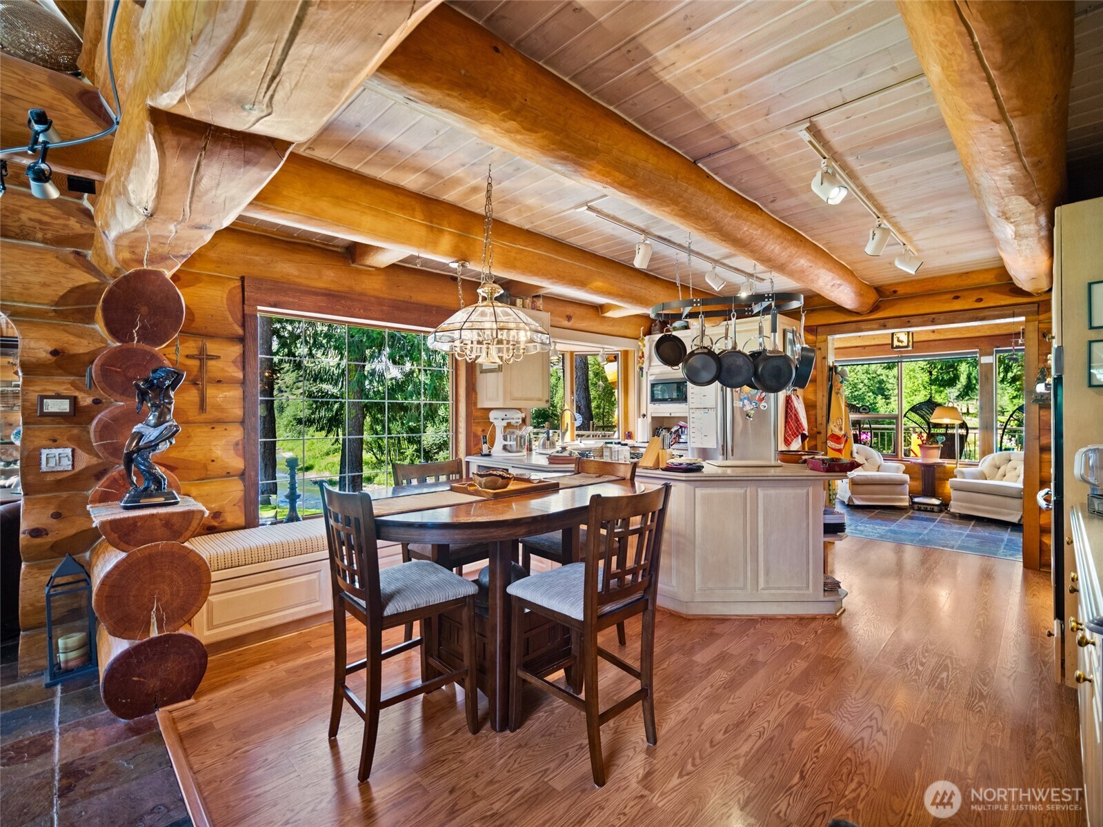 13537 Entiat River Road Entiat, WA 98822 - Photo 8 of 40 a view of a patio with table and chairs and potted plants