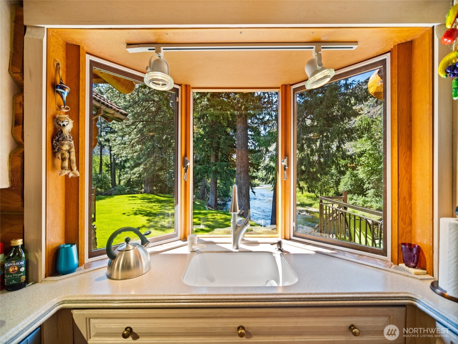 13537 Entiat River Road Entiat, WA 98822 - Photo 9 of 40 a bathroom with a large window and a sink