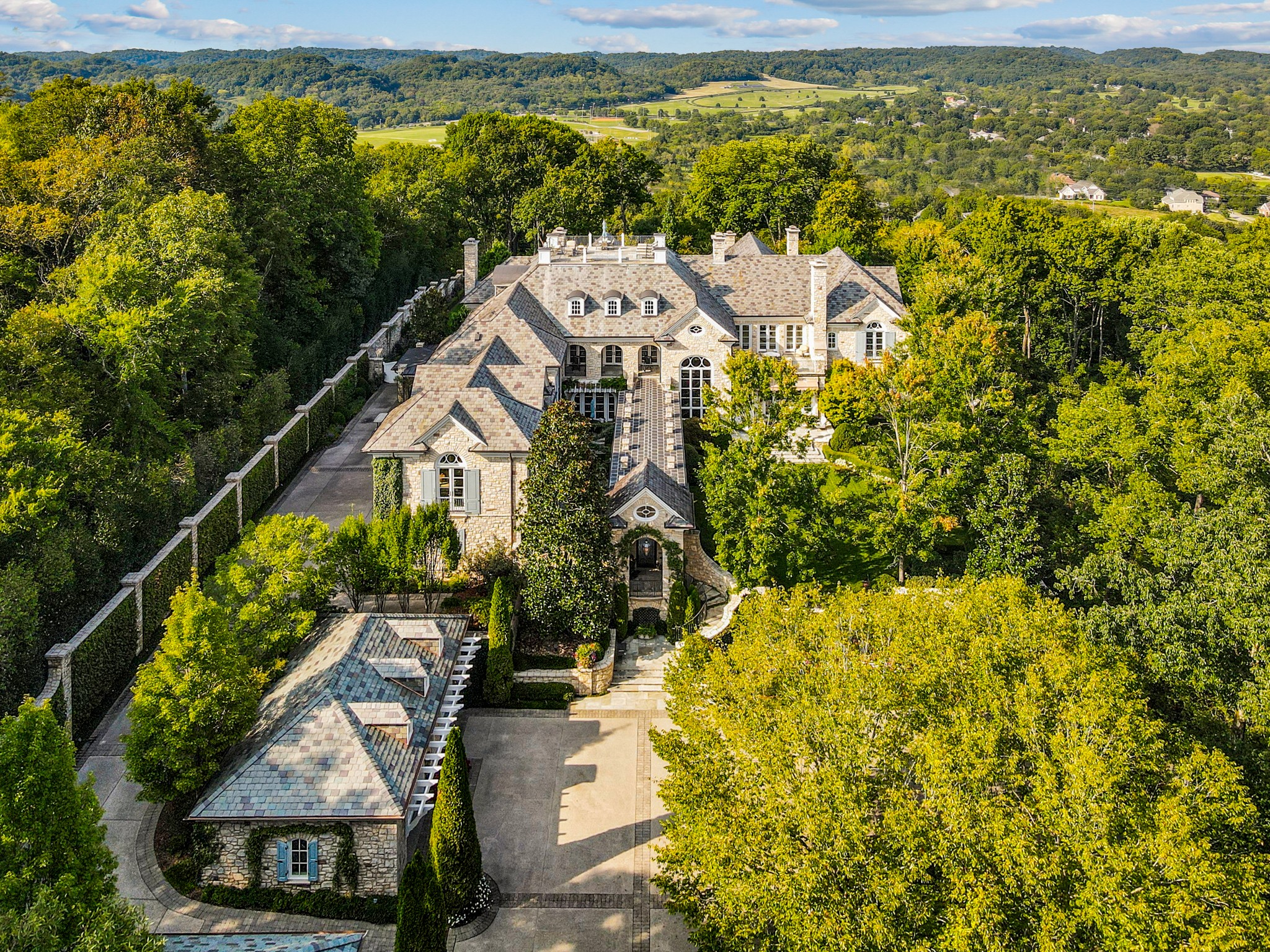 1710 Talbot Trail Franklin, TN 37069 - Photo 7 of 47 a view of a house with a yard and potted plants