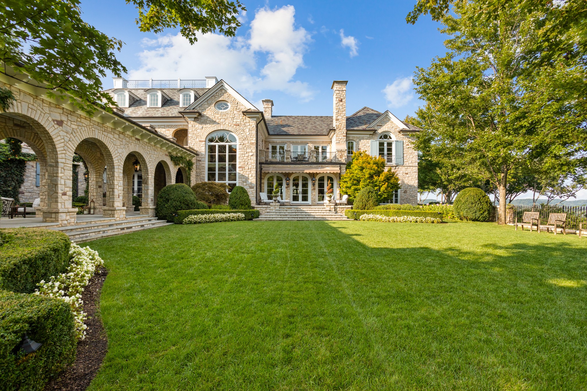 1710 Talbot Trail Franklin, TN 37069 - Photo 8 of 47 a front view of a house with a garden