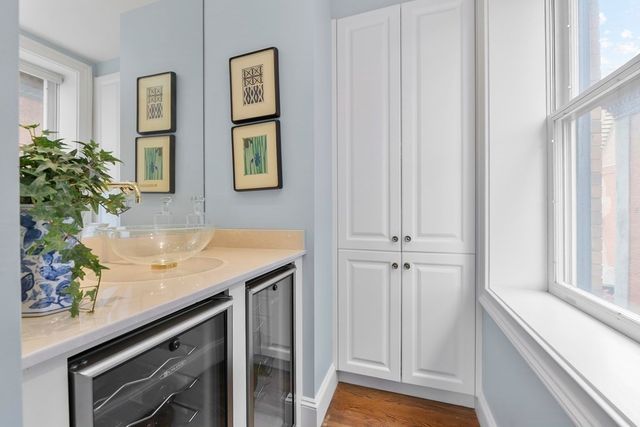a view of a kitchen cabinets and window