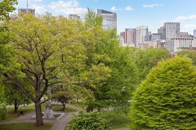 a view of a city with tall buildings
