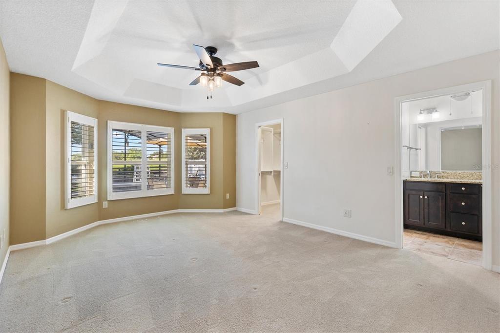 7351 Southeast 169th Cote Loop The Villages, FL 32162 - Photo 15 of 32 a view of an empty room with a window