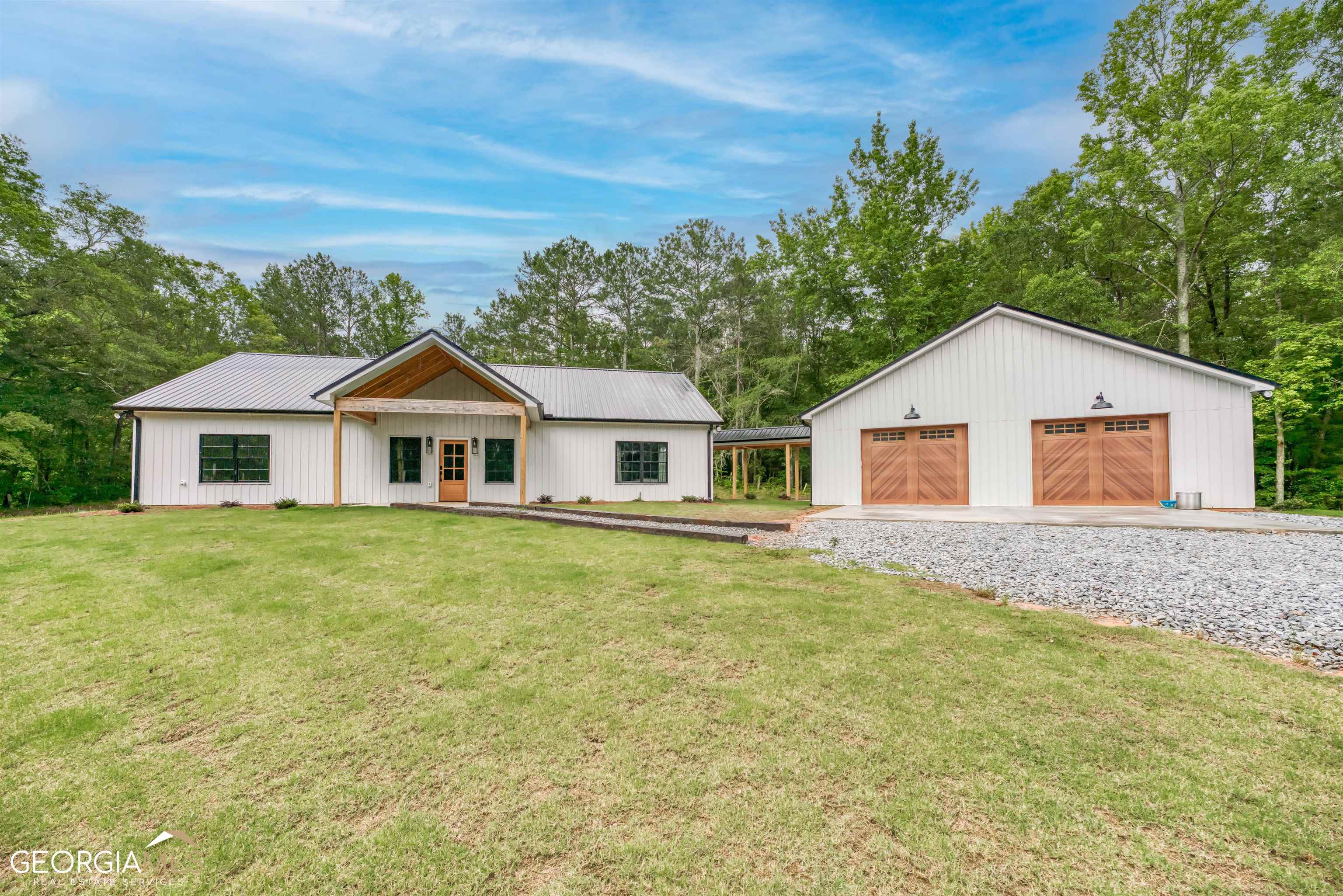 1439 Sandy Cross Road Carlton, GA 30627 - Photo 1 of 1 a front view of a house with yard and green space