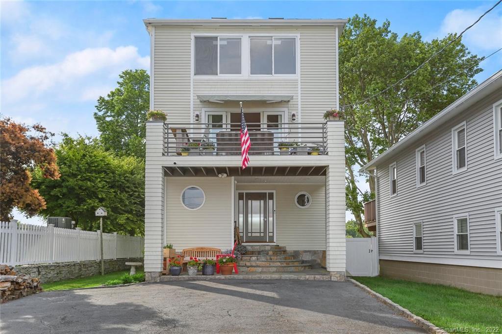 a front view of a house with yard