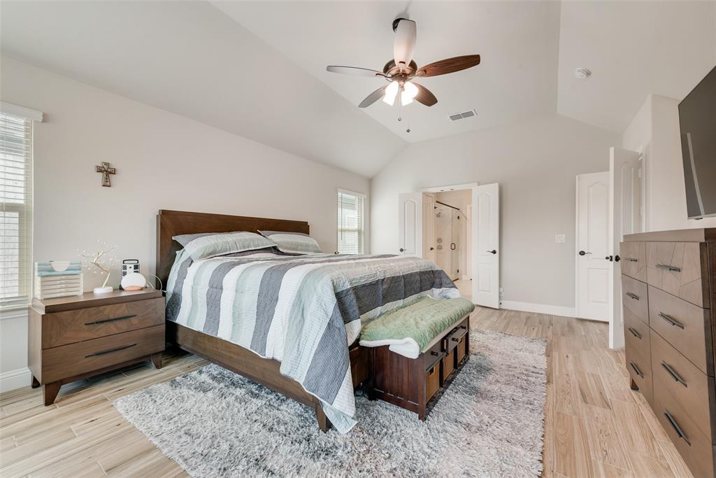 2010 Dundalk Lane Forney, TX 75126 - Photo 25 of 37 a bedroom with a bed and ceiling fan