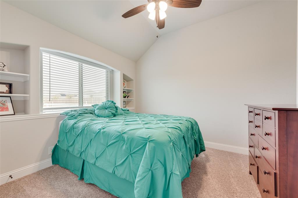 2010 Dundalk Lane Forney, TX 75126 - Photo 32 of 37 a bedroom with a bed and a window