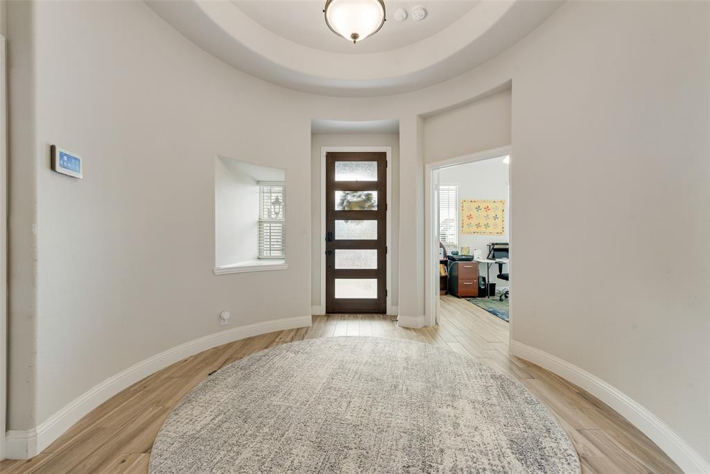 2010 Dundalk Lane Forney, TX 75126 - Photo 7 of 37 an empty room with closet and a chandelier fan