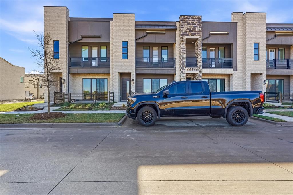 1203 Doris May Drive Allen, TX 75013 - Photo 1 of 35 a car parked in front of a brick house
