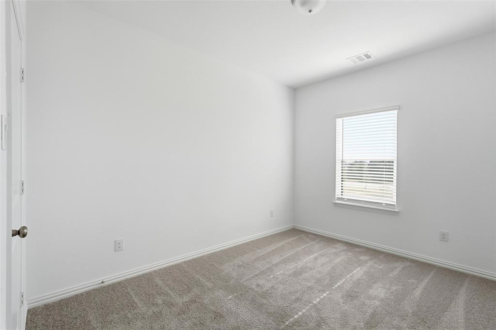 1203 Doris May Drive Allen, TX 75013 - Photo 16 of 35 an empty room with a window