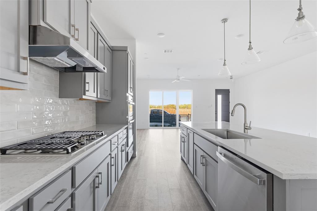 1203 Doris May Drive Allen, TX 75013 - Photo 24 of 35 a kitchen with lots of counter top space
