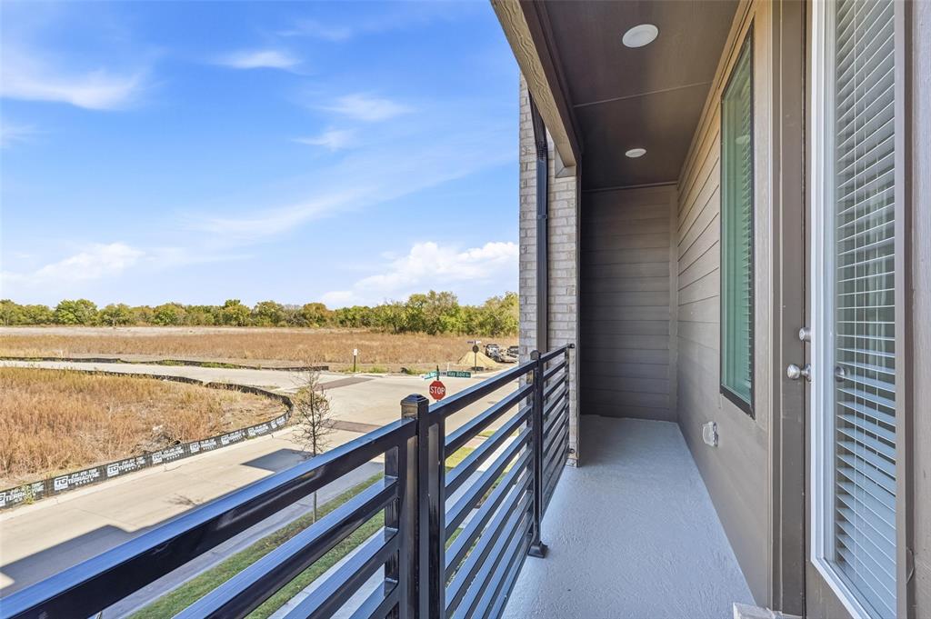 1203 Doris May Drive Allen, TX 75013 - Photo 31 of 35 a view of a balcony with lake and mountain view