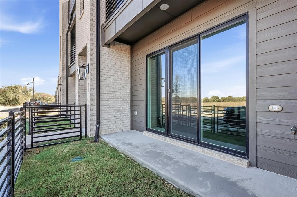 1203 Doris May Drive Allen, TX 75013 - Photo 32 of 35 a view of a balcony with an outdoor space