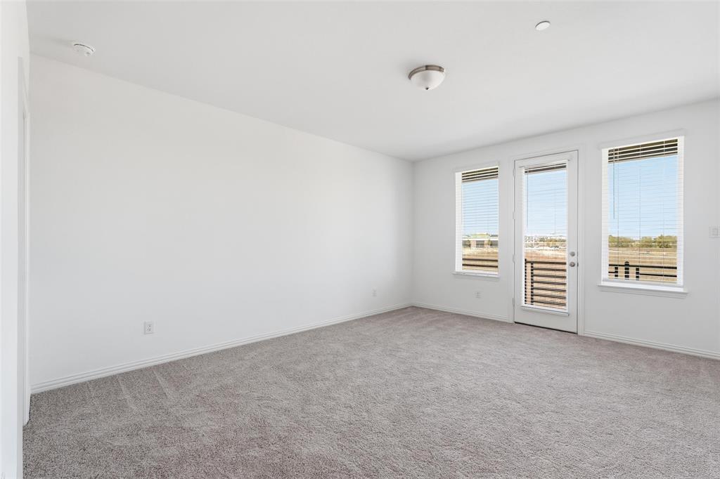 1203 Doris May Drive Allen, TX 75013 - Photo 4 of 35 an empty room with windows