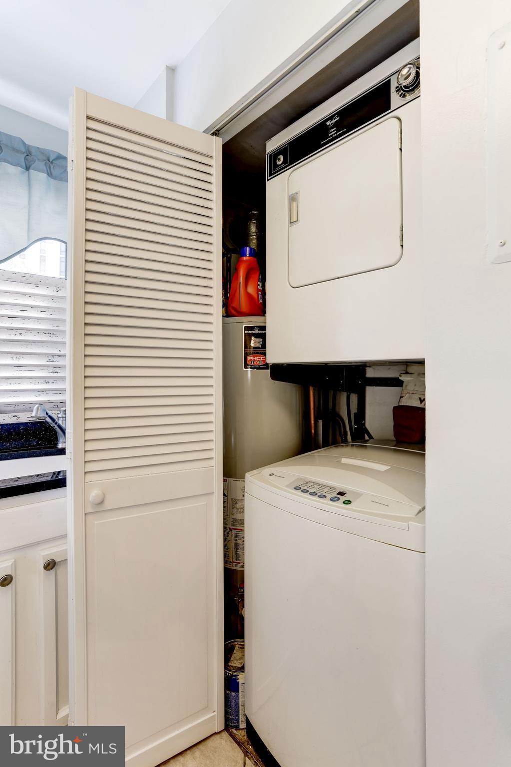 2604 Tunlaw Road Northwest, Unit 2 Washington, DC 20007 - Photo 12 of 25 a utility room with dryer and washer