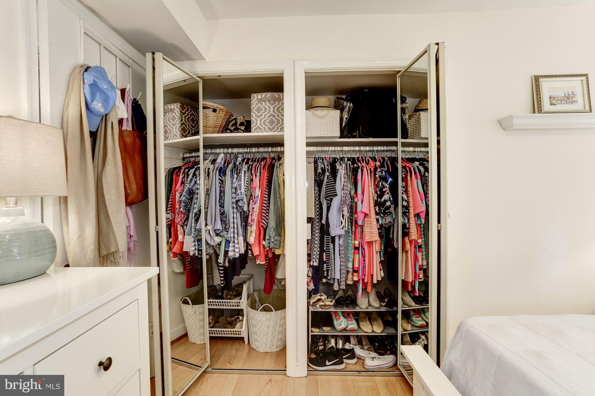 2604 Tunlaw Road Northwest, Unit 2 Washington, DC 20007 - Photo 17 of 25 a view of walk in closet with clothes and shoes