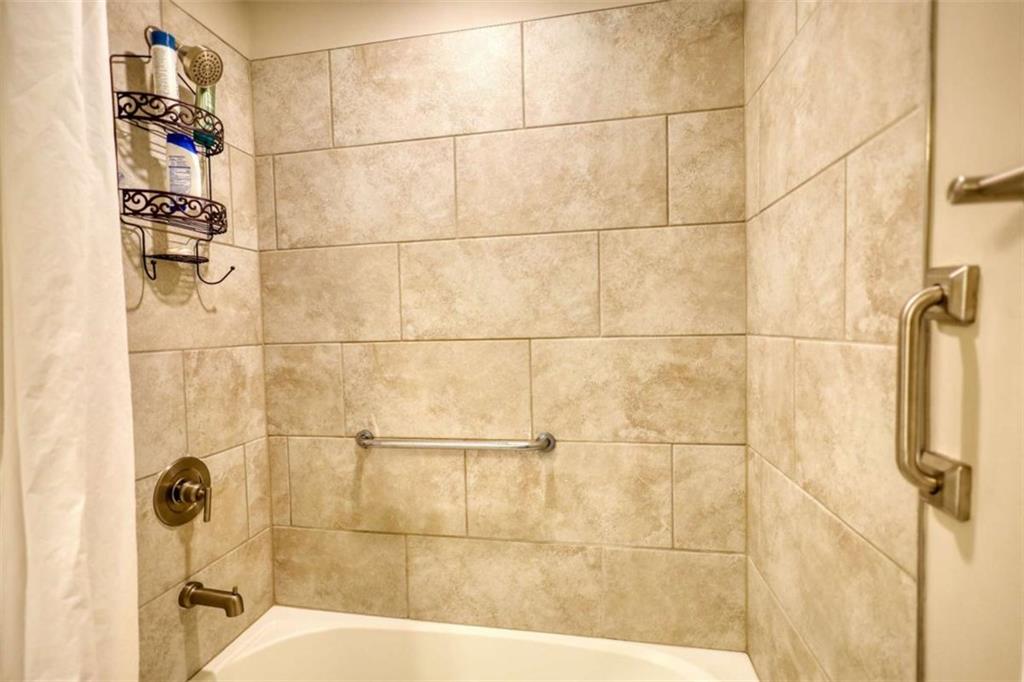 479 Glenmont Road Grayson, GA 30017 - Photo 51 of 58 a bathroom with a shower