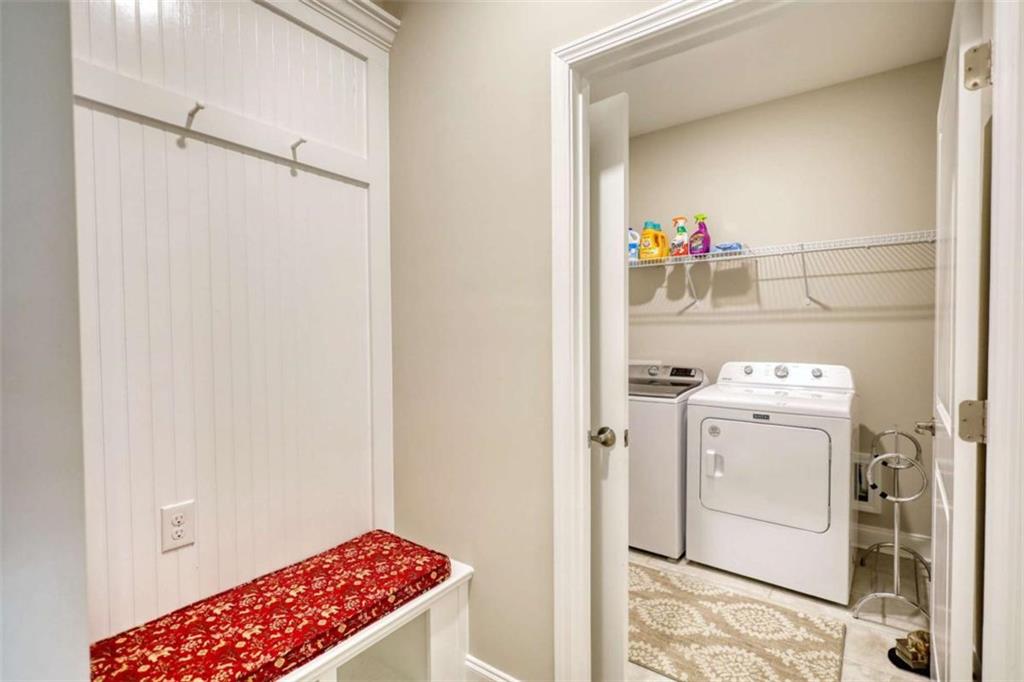 479 Glenmont Road Grayson, GA 30017 - Photo 6 of 58 a utility room with dryer and washer