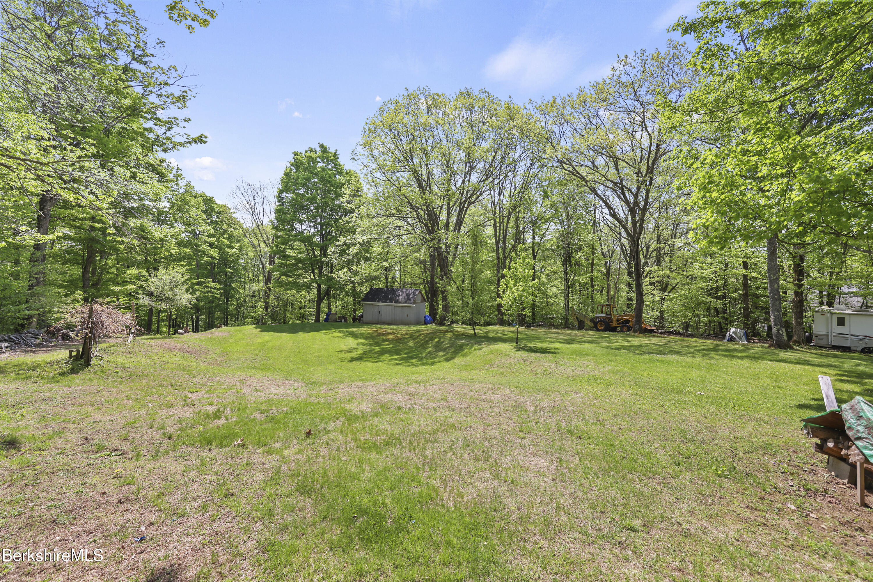 192 Curran Road Cheshire, MA 01225 - Photo 39 of 50 a view of a field with trees in the background