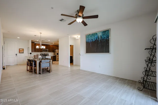 a view of a kitchen with furniture and a table wooden floor