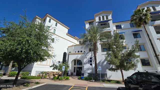 a view of a building with a street