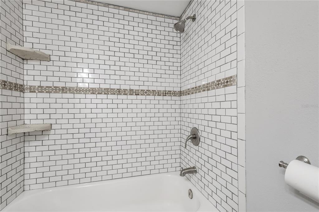 3325 Bayshore Boulevard, Unit A17 Tampa, FL 33629 - Photo 16 of 31 a bathroom with a shower