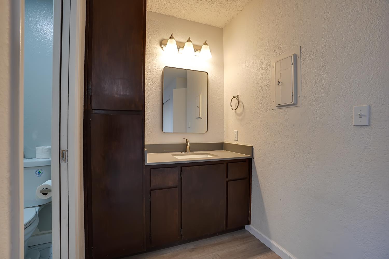 6724 Plymouth Road, Unit 88 Stockton, CA 95207 - Photo 14 of 21 a bathroom with a double vanity sink and a mirror