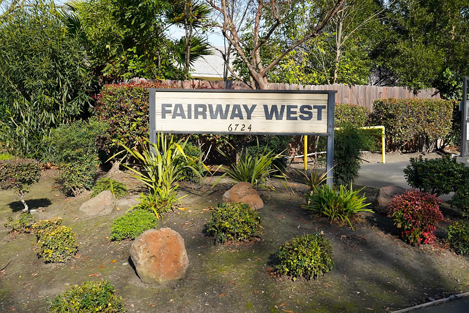 6724 Plymouth Road, Unit 88 Stockton, CA 95207 - Photo 2 of 21 a view of a street with potted plants