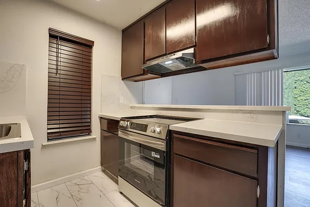 a utility room with washer and dryer
