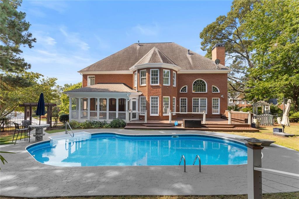 a front view of a house with swimming pool