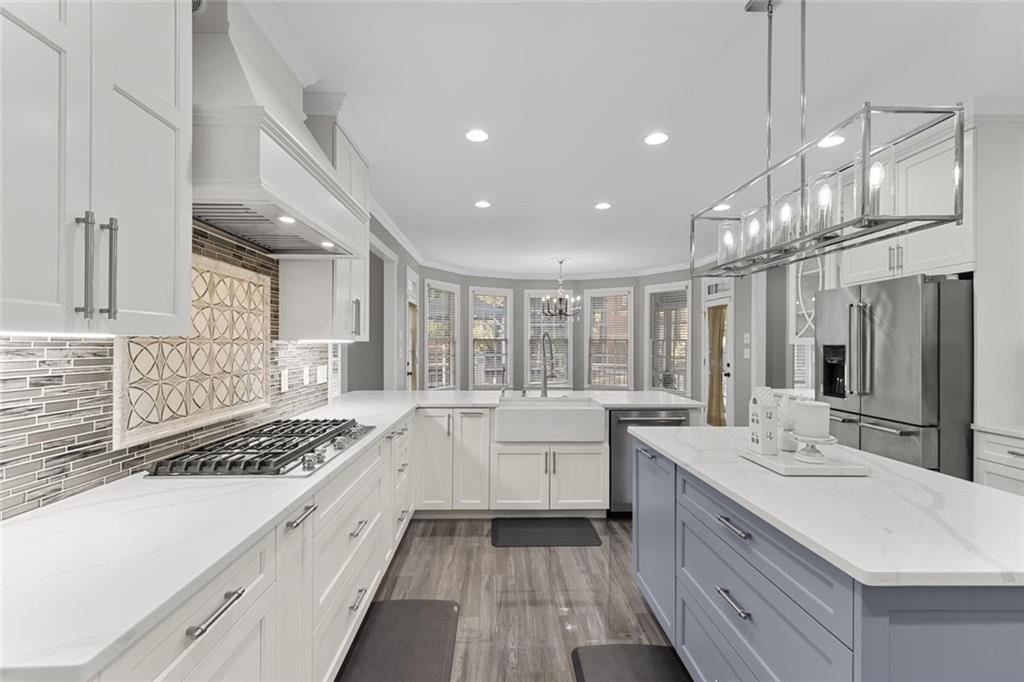 1225 Mobile Way Grayson, GA 30017 - Photo 15 of 51 a large white kitchen with a large window