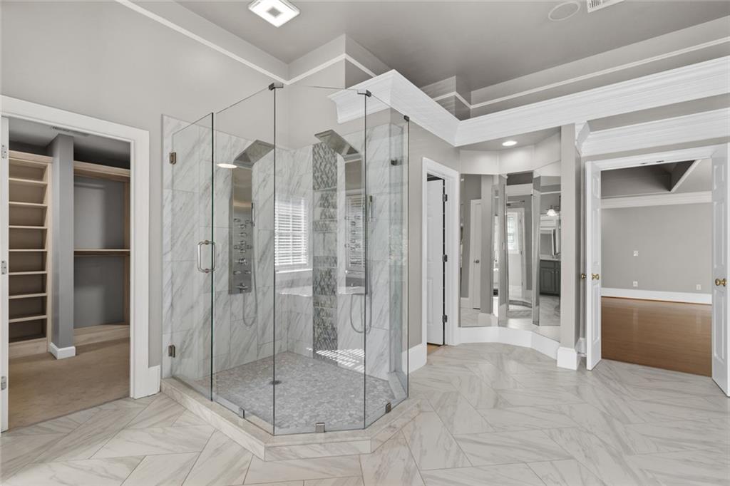 1225 Mobile Way Grayson, GA 30017 - Photo 25 of 51 a view of a bathroom with a shower