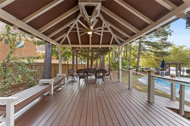 a aerial view of a house with swimming pool and garden