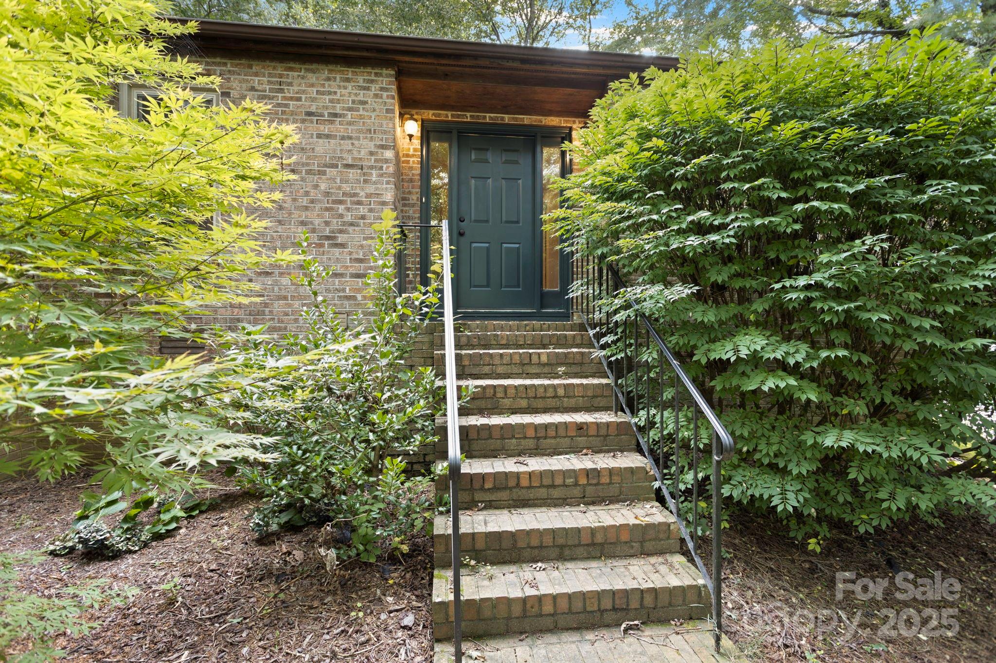 207 Mint Way Flat Rock, NC 28731 - Photo 4 of 27 a view of entryway with outdoor area