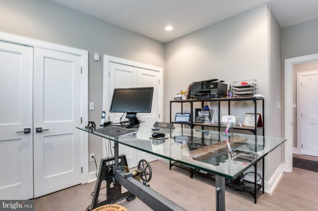 a room with a table and chairs