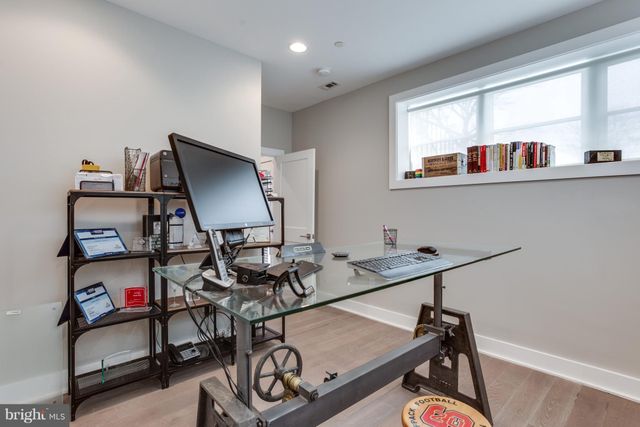 a workspace with furniture and a window