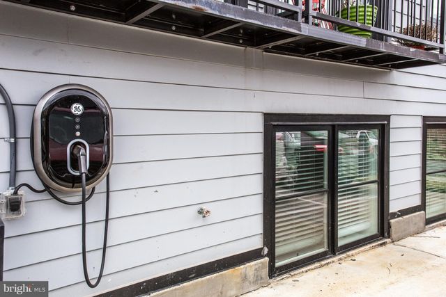 a close view of a sink a vanity and a window