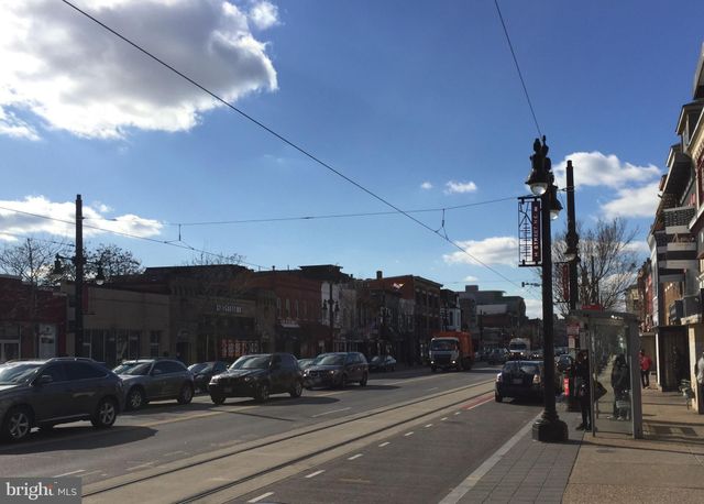 a view of outdoor space with a sign board