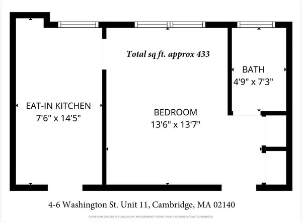a utility room with cabinets dryer and washer