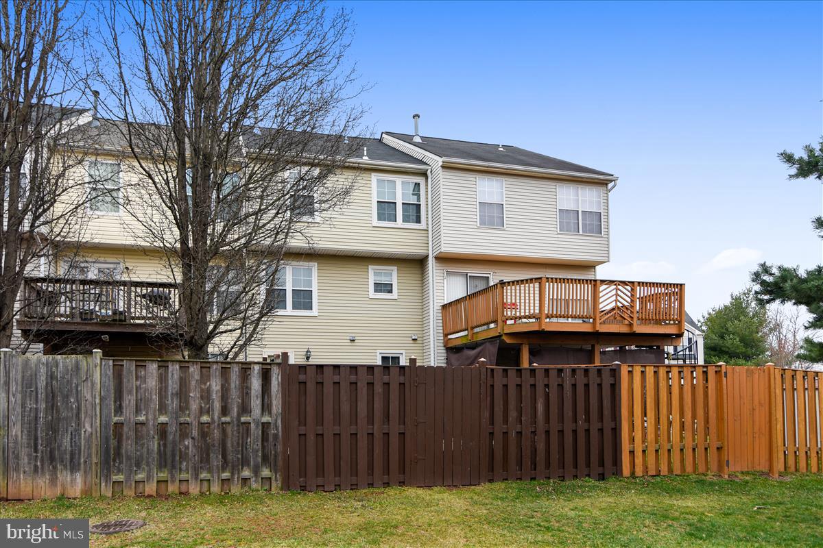 20783 Apollo Terrace Ashburn, VA 20147 - Photo 25 of 31 Rear view of property (brown fence)
