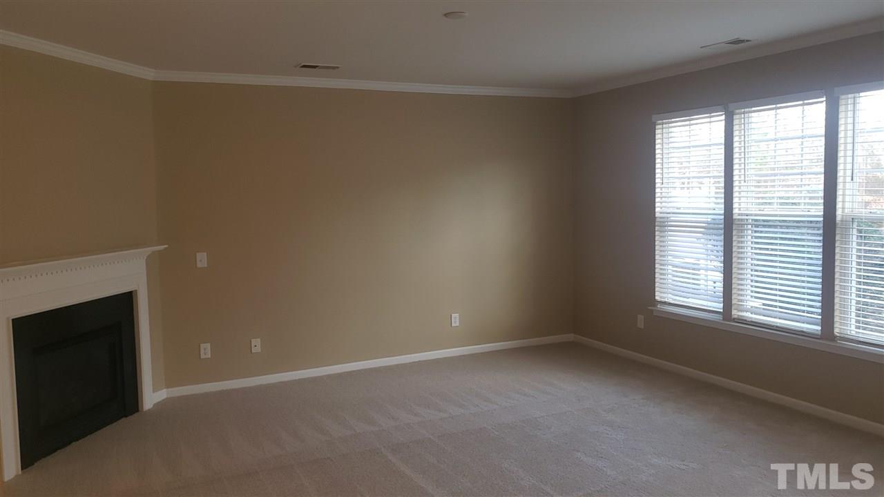 9708 Renfield Drive Raleigh, NC 27617 - Photo 14 of 24 an empty room with a window