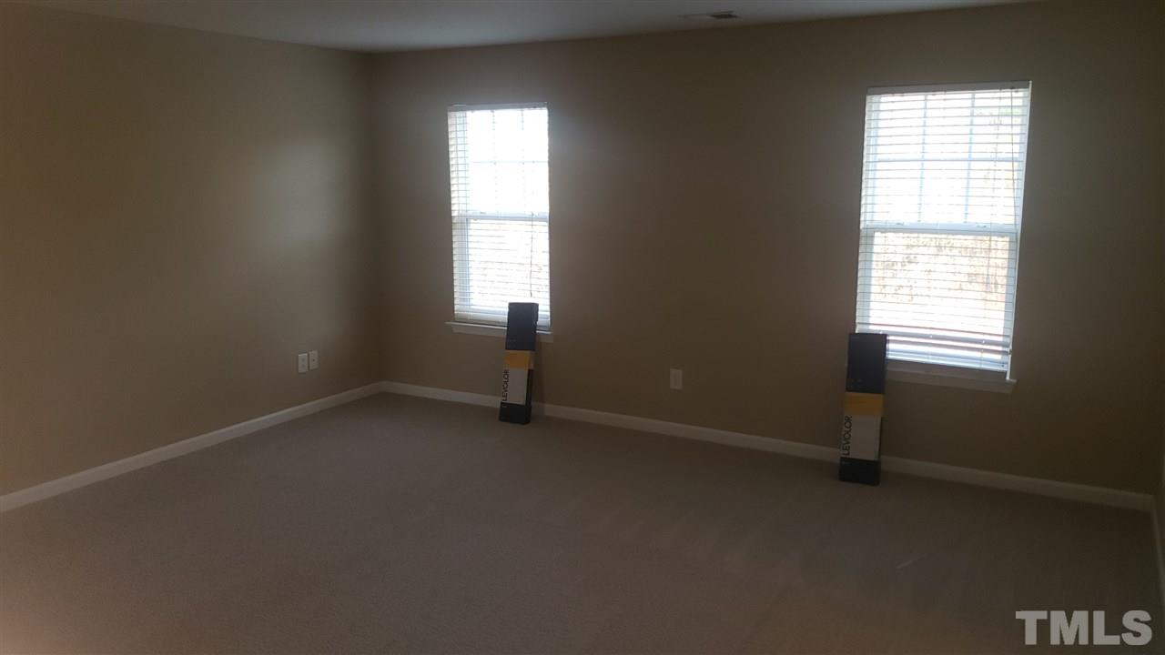 9708 Renfield Drive Raleigh, NC 27617 - Photo 16 of 24 an empty room with a window