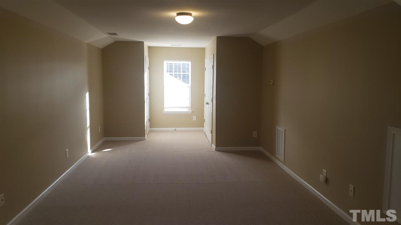 9708 Renfield Drive Raleigh, NC 27617 - Photo 20 of 24 a view of hallway with closet