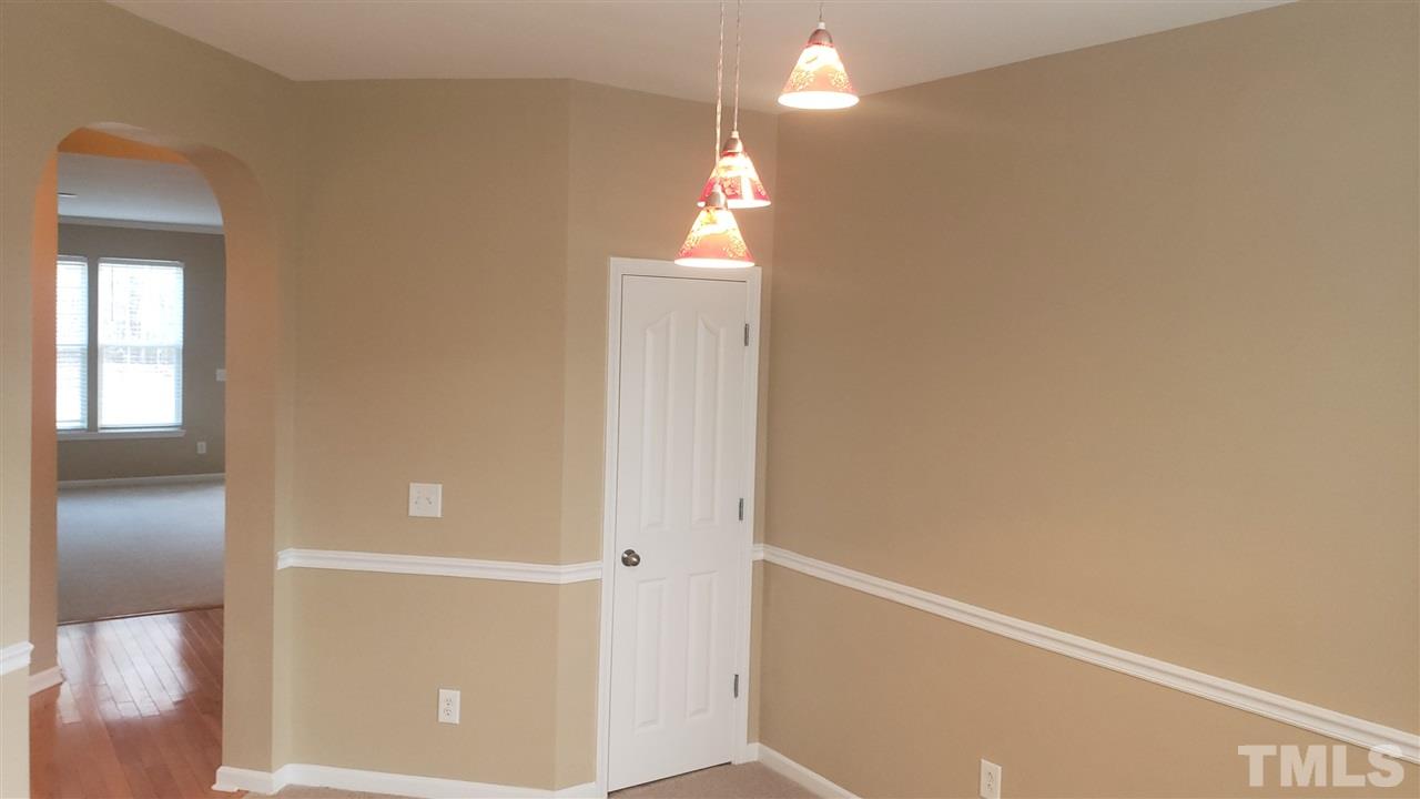 9708 Renfield Drive Raleigh, NC 27617 - Photo 7 of 24 a view of a hallway with entryway