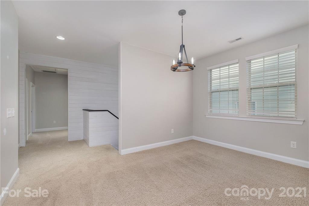 120 Helton Lane Fort Mill, SC 29708 - Photo 13 of 21 a view of a room with windows and chandelier fan